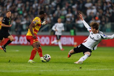 Afimico Pululu ve Jan Ziolkowski, Puchar Polski maçında Stadion Miejski Legii Warszawa 'daki Legia Warszawa ve Jagiellonia Bialystok takımları arasında görüldü. Jozefa Pilsudskiego (Maciej Rogowski)