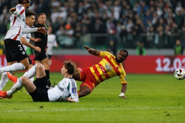 Afimico Pululu ve Jan Ziolkowski, Puchar Polski maçında Stadion Miejski Legii Warszawa 'daki Legia Warszawa ve Jagiellonia Bialystok takımları arasında görüldü. Jozefa Pilsudskiego (Maciej Rogowski)