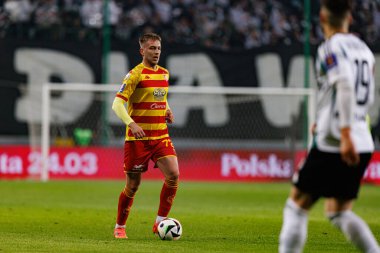 Mateusz Skrzypczak, Puchar Polski maçı sırasında Stadion Miejski Legii Warszawa 'daki Legia Warszawa ve Jagiellonia Bialystok takımları arasında görüldü. Jozefa Pilsudskiego (Maciej Rogowski)