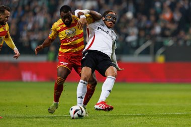 Afimico Pululu ve Steven Kapuadi, Puchar Polski maçında Stadion Miejski Legii Warszawa 'daki Legia Warszawa ve Jagiellonia Bialystok takımları arasında görüldü. Jozefa Pilsudskiego (Maciej Rogowski)