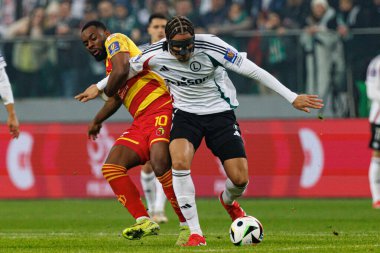 Afimico Pululu ve Steven Kapuadi, Puchar Polski maçında Stadion Miejski Legii Warszawa 'daki Legia Warszawa ve Jagiellonia Bialystok takımları arasında görüldü. Jozefa Pilsudskiego (Maciej Rogowski)