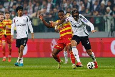 Afimico Pululu ve Steven Kapuadi, Puchar Polski maçında Stadion Miejski Legii Warszawa 'daki Legia Warszawa ve Jagiellonia Bialystok takımları arasında görüldü. Jozefa Pilsudskiego (Maciej Rogowski)