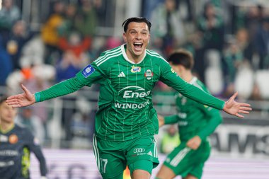 Renat Dadashov, Stadyum 'daki Radomiak Radom ve Widzew Lodz takımları arasında oynanan PKO BP Ekstraklasa maçında gol attıktan sonra kutlama yaparken görüldü. Braci Czachorow (Maciej Rogowski)