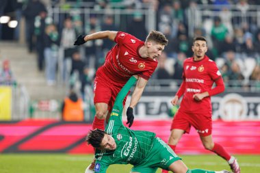 Mateusz Zyro ve Perotti, PKO BP Ekstraklasa maçında Radomiak Radom ve Widzew Lodz takımları arasında Stadion Miejski im 'de görüldü. Braci Czachorow (Maciej Rogowski)