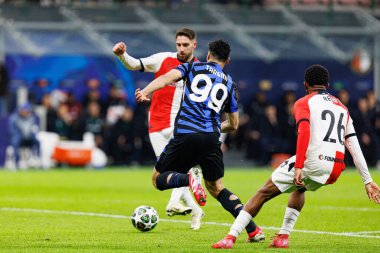 Luka Ivanusec ve Mehdi Taremi, UEFA Şampiyonlar Ligi maçında Milano ve Feyenoord FC (Maciej Rogowski) takımları arasında görüldü.)