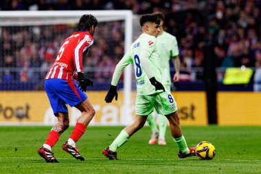 Rodrigo de Paul ve Pedri LaLiga EA SPORTS maçında Atletico de Madrid ve FC Barcelona (Maciej Rogowski) takımları arasında görüldü.)