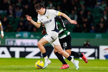 Maximiliano Araujo ve Gustavo Sa Liga Portekiz maçı sırasında Estadio Jose Alvalade 'de (Maciej Rogowski) Sporting CP ve FC Famalicao takımları arasında görüldü.)