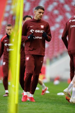Jakub Kiwior, 2025 Mart 'ındaki maçlardan önce Polonya Milli Futbol Takımı' nın üçüncü antrenmanı sırasında görüldü (Maciej Rogowski)