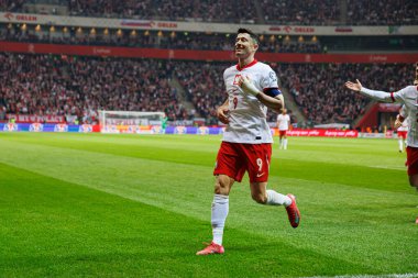 Robert Lewandowski, PGE Narodowy (Maciej Rogowski) 'de Polonya ve Litvanya milli takımları arasındaki Dünya Kupası 2026 Avrupa ön eleme maçında gol attıktan sonra kutlama yaparken görüldü.)