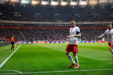 Robert Lewandowski, PGE Narodowy (Maciej Rogowski) 'de Polonya ve Litvanya milli takımları arasındaki Dünya Kupası 2026 Avrupa ön eleme maçında gol attıktan sonra kutlama yaparken görüldü.)