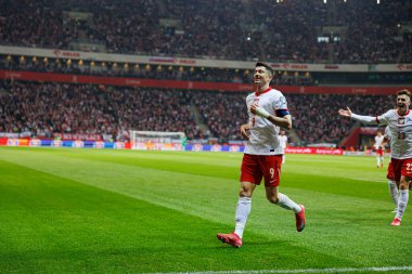 Robert Lewandowski, PGE Narodowy (Maciej Rogowski) 'de Polonya ve Litvanya milli takımları arasındaki Dünya Kupası 2026 Avrupa ön eleme maçında gol attıktan sonra kutlama yaparken görüldü.)