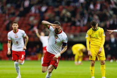 Robert Lewandowski, PGE Narodowy (Maciej Rogowski) 'de Polonya ve Litvanya milli takımları arasındaki Dünya Kupası 2026 Avrupa ön eleme maçında gol attıktan sonra kutlama yaparken görüldü.)