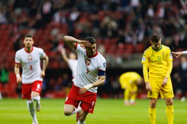 Robert Lewandowski, PGE Narodowy (Maciej Rogowski) 'de Polonya ve Litvanya milli takımları arasındaki Dünya Kupası 2026 Avrupa ön eleme maçında gol attıktan sonra kutlama yaparken görüldü.)