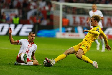 Przemyslaw Frankowski ve Justas Lasickas, 2026 Dünya Kupası 'nda Polonya ve Litvanya milli takımları arasında PGE Narodowy (Maciej Rogowski)