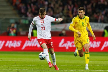 Krzysztof Piatek ve Gvidas Gineitis, 2026 Dünya Kupası 'nda Polonya ve Litvanya milli takımları arasında PGE Narodowy (Maciej Rogowski)