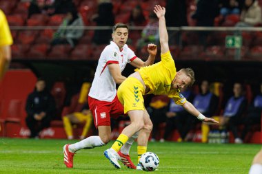 Jan Bednarek ve Domantas Antanavicius, 2026 Dünya Kupası 'nda Polonya ve Litvanya milli takımları arasında PGE Narodowy (Maciej Rogowski)