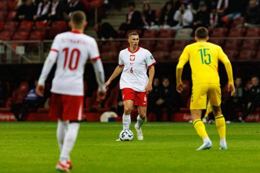 Jakub Piotrowski, 2026 Dünya Kupası 'nda Polonya ve Litvanya milli takımları arasında PGE Narodowy (Maciej Rogowski)