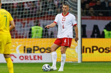 Jakub Piotrowski, 2026 Dünya Kupası 'nda Polonya ve Litvanya milli takımları arasında PGE Narodowy (Maciej Rogowski)