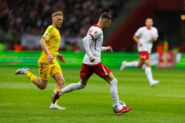 Domantas Antanavicius ve Sebastian Szymanski, 2026 Dünya Kupası 'nda Polonya ve Litvanya milli takımları arasında PGE Narodowy (Maciej Rogowski)