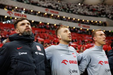Bartlomiej Dragowski, Mateusz Skrzypczak ve Adam Buksa, 2026 Dünya Kupası 'nda Polonya ve Litvanya milli takımları arasında PGE Narodowy (Maciej Rogowski)