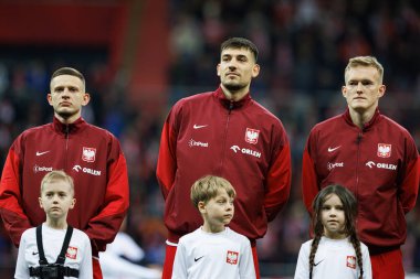 Sebastian Szymanski, Jakub Moder ve Karol Swiderski, 2026 Dünya Kupası 'nda Polonya ve Litvanya milli takımları arasında PGE Narodowy (Maciej Rogowski)