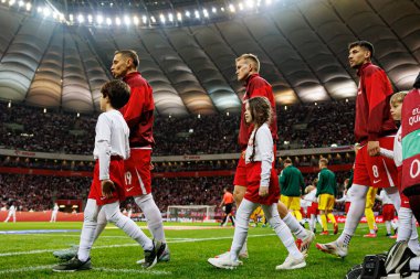 Przemyslaw Frankowski, Karol Swiderski ve Jakub Moder, PGE Narodowy 'de Polonya ve Litvanya milli takımları arasındaki Dünya Kupası 2026 Avrupa Ön eleme maçında görüldü (Maciej Rogowski)