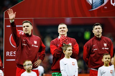 Jan Bednarek, Lukasz Skorupski ve Robert Lewandowski, 2026 Dünya Kupası 'nda Polonya ve Litvanya milli takımları arasında PGE Narodowy (Maciej Rogowski)