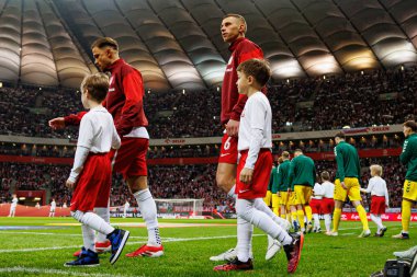 Matty Cash ve Jakub Piotrowski, 2026 Dünya Kupası 'nda Polonya ve Litvanya milli takımları arasında PGE Narodowy (Maciej Rogowski)