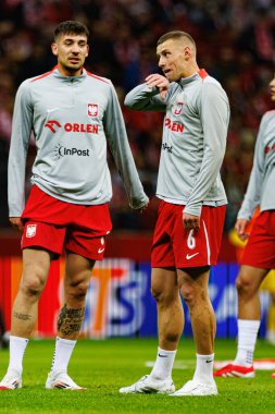 Jakub Moder ve Jakub Piotrowski, 2026 Dünya Kupası 'nda Polonya ve Litvanya milli takımları arasında PGE Narodowy (Maciej Rogowski)