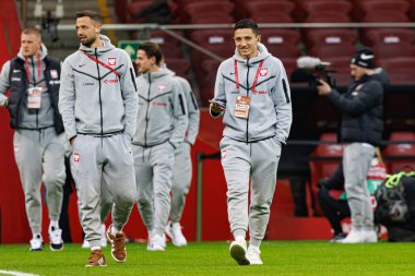 Mateusz Wieteska ve Bartosz Slisz, 2026 Dünya Kupası 'nda Polonya ve Litvanya milli takımları arasında PGE Narodowy (Maciej Rogowski)