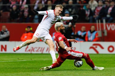 Karol Swiderski ve Enrico Pepe, 2026 Dünya Kupası eleme maçında PGE Narodowy 'de Polonya ve Malta milli takımları arasında görüldü (Maciej Rogowski)