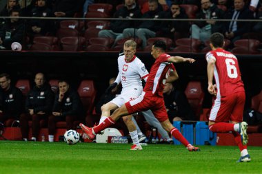 Dünya Kupası 2026 eleme maçında Polonya ve Malta milli takımları arasında PGE Narodowy 'de Karol Swiderski ve İlyas Chouaref görüldü (Maciej Rogowski)