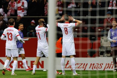 Karol Swiderski ve Jakub Moder, PGE Narodowy 'de (Maciej Rogowski) Polonya ve Malta milli takımları arasında oynanan 2026 Dünya Kupası ön eleme maçında gol attıktan sonra kutlama yaparken görüldü.)