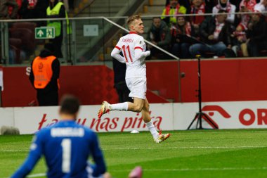 Karol Swiderski, PGE Narodowy (Maciej Rogowski) 'de Polonya ve Malta milli takımları arasında oynanan 2026 Dünya Kupası ön eleme maçında gol attıktan sonra kutlama yaparken görüldü.)
