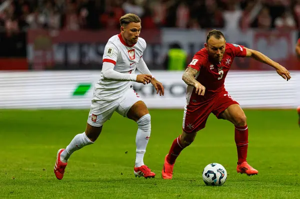 Matty Cash ve Ryan Camenzuli, 2026 Dünya Kupası eleme maçında Polonya ve Malta milli takımları arasında PGE Narodowy 'da görüldü (Maciej Rogowski)