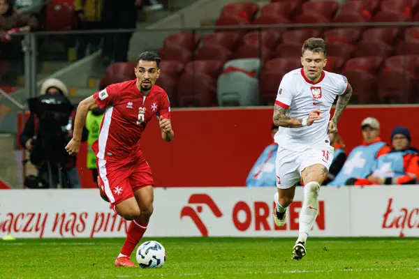 Ylyas Chouaref ve Kamil Piatkowski, 2026 Dünya Kupası 'nda Polonya ve Malta milli takımları arasında PGE Narodowy (Maciej Rogowski)