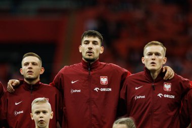 Sebastian Szymanski, Jakub Moder ve Karol Swiderski, 2026 Dünya Kupası eleme maçında Polonya ve Malta milli takımları arasında PGE Narodowy 'da (Maciej Rogowski)
