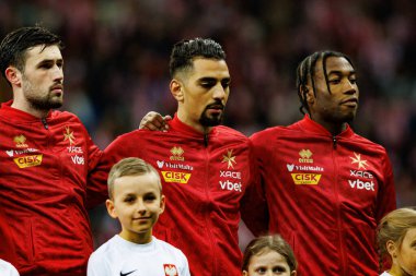 Matthew Guillaumier, İlyas Chouaref ve Paul Mbong, 2026 Dünya Kupası eleme maçında Polonya ve Malta milli takımları arasında PGE Narodowy 'da görüldü (Maciej Rogowski)