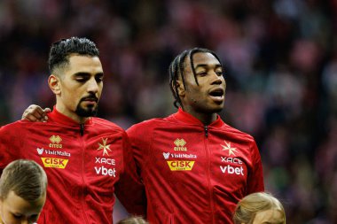 Ylyas Chouaref ve Paul Mbong, 2026 Dünya Kupası eleme maçında PGE Narodowy 'da Polonya ve Malta milli takımları arasında görüldü (Maciej Rogowski)