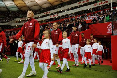 Mateusz Bogusz ve Karol Swiderski, 2026 Dünya Kupası eleme maçında Polonya ve Malta milli takımları arasında PGE Narodowy (Maciej Rogowski)