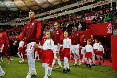 Mateusz Bogusz ve Karol Swiderski, 2026 Dünya Kupası eleme maçında Polonya ve Malta milli takımları arasında PGE Narodowy (Maciej Rogowski)