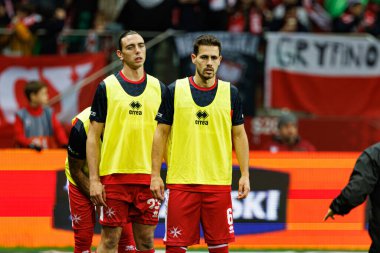 Alexander Satariano ve Matthew Guillaumier, 2026 Dünya Kupası eleme maçında Polonya ve Malta milli takımları arasında PGE Narodowy (Maciej Rogowski)