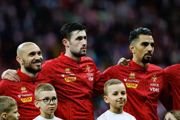 Teddy Teuma, Matthew Guillaumier ve Ylyas Chouaref, 2026 Dünya Kupası eleme maçında Polonya ve Malta milli takımları arasında PGE Narodowy 'da görüldü (Maciej Rogowski)