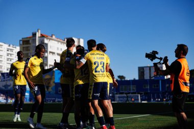 Estoril 'in oyuncuları Liga Portekiz maçı sırasında Yanis Begraoui' nin Estadio Antonio Coimbra da Mota 'daki GD Estoril Praia ve FC Porto takımları arasında attığı golü kutlarken görülüyor (Maciej Rogowski)