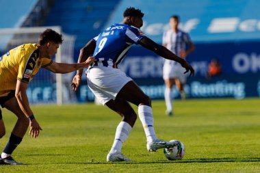Alex Bacher ve Samuel Aghehowa Liga Portekiz maçı sırasında Estoril Praia ve FC Porto takımları arasında Estadio Antonio Coimbra da Mota (Maciej Rogowski)