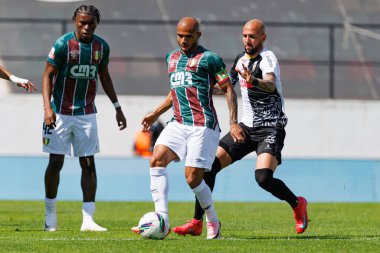 Leo Cordeiro ve Angelo Neto Liga Portekiz maçı sırasında Estrela Amadora ve SC Farense takımları arasında Estadio Jose Gomes 'de (Maciej Rogowski)
