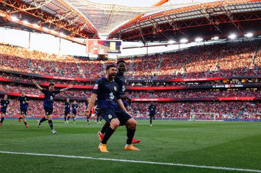 Guven Yalçın, Liga Portekiz maçında SL Benfica ve FC Arouca (Maciej Rogowski) takımları arasında gol üstüne gol atarken görüldü.)
