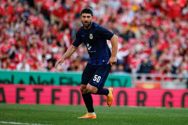 Guven Yalçın, Liga Portekiz maçında SL Benfica ve FC Arouca (Maciej Rogowski) takımları arasında gol üstüne gol atarken görüldü.)