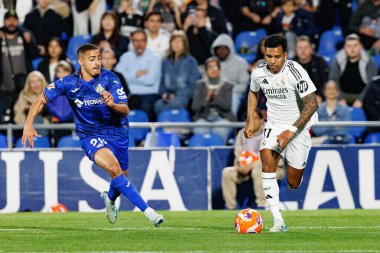 Ismael Bekhoucha ve Rodrygo, Estadio Coliseum 'da (Maciej Rogowski) Getafe CF ve Real Madrid CF takımları arasında oynanan LaLiga EA Spor Maçı sırasında görüldü.)