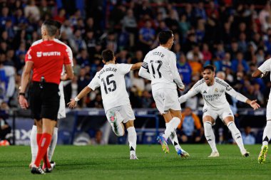 Arda Güler ve Raul Asencio, Estadio Coliseum 'daki Getafe CF ve Real Madrid CF takımları arasında LaLiga EA SPORTS maçında gol attıktan sonra kutlama yaparken görüldü (Maciej Rogowski)